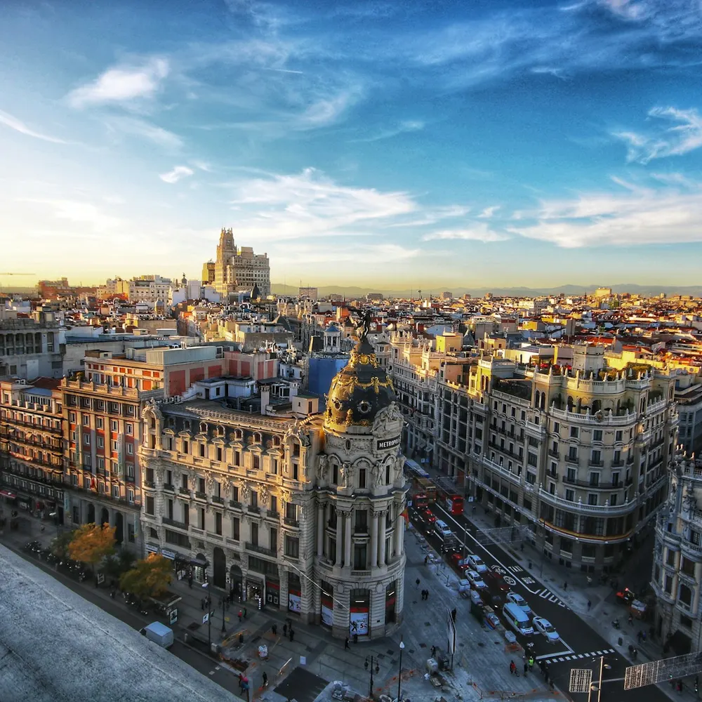 View of Gran Vía in Madrid with the Metrópolis building